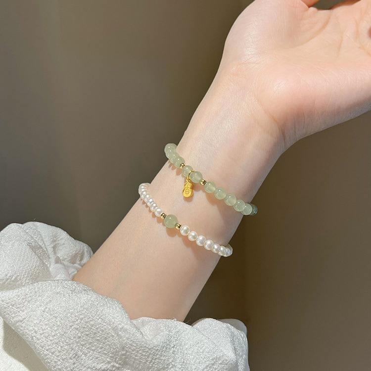 珍珠小米粒手串(米粒珍珠手链的编法大全视频)